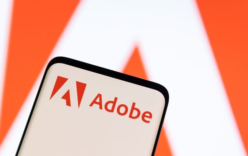 Adobe forecasts annual revenue below estimates