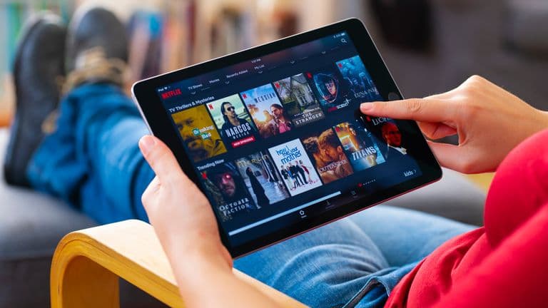 Netflix to raise prices for some subscribers as it reports 18.9 million new customers in three months