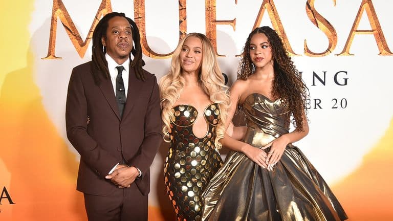 Jay-Z appears on red carpet with Beyonce and Blue Ivy after he was accused of raping girl, 13