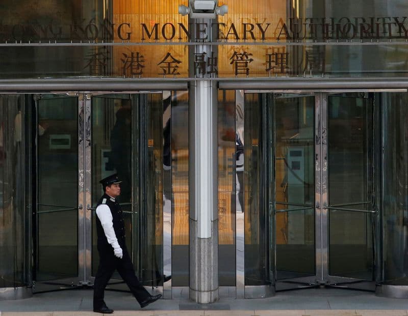 Hong Kong central bank cuts interest rate tracking Fed move, banks follow