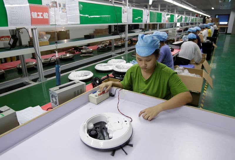 China Nov factory activity expands for second month as Trump threats loom By Reuters