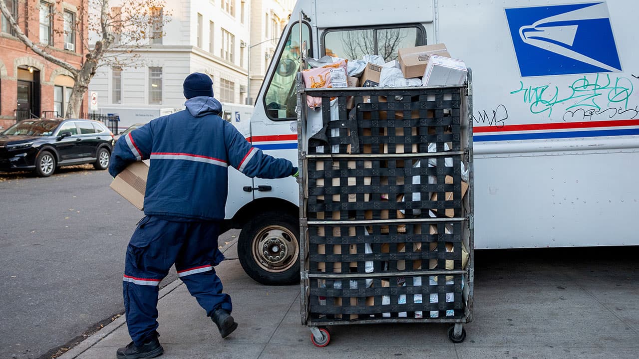 USPS halts pension contributions after warning of looming cash crisis