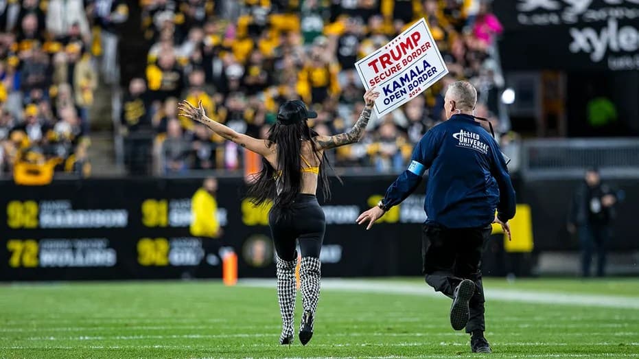 Woman runs onto Steelers' field with pro-Trump sign as former president attends game