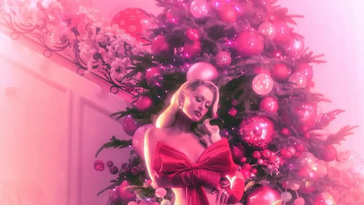 Paris Hilton strips down for racy Christmas photoshoot: ‘My presence is a present’