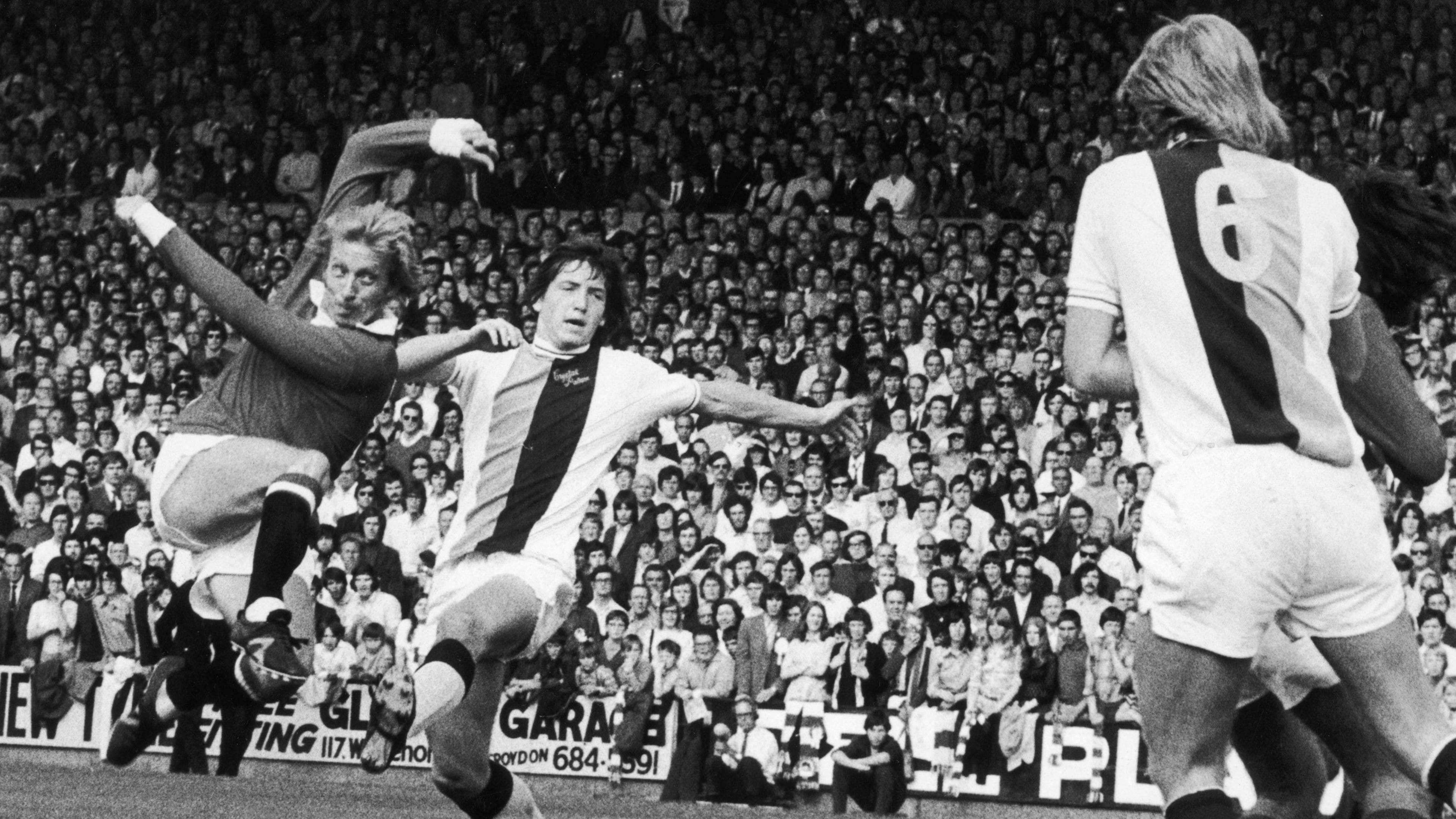 Denis Law: Manchester United and Scotland legend dies aged 84
