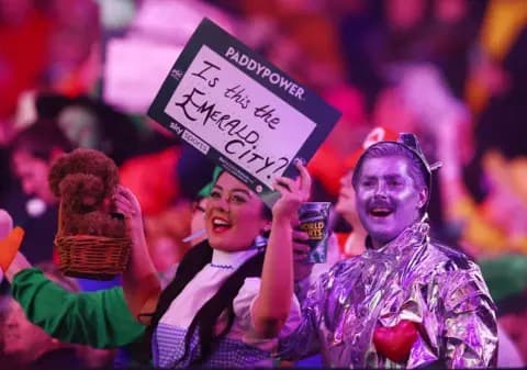 ‘I lost my voice laughing’: Dart fans on the pantomime of watching live