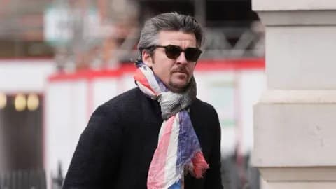 Joey Barton guilty of assault for kicking wife in head