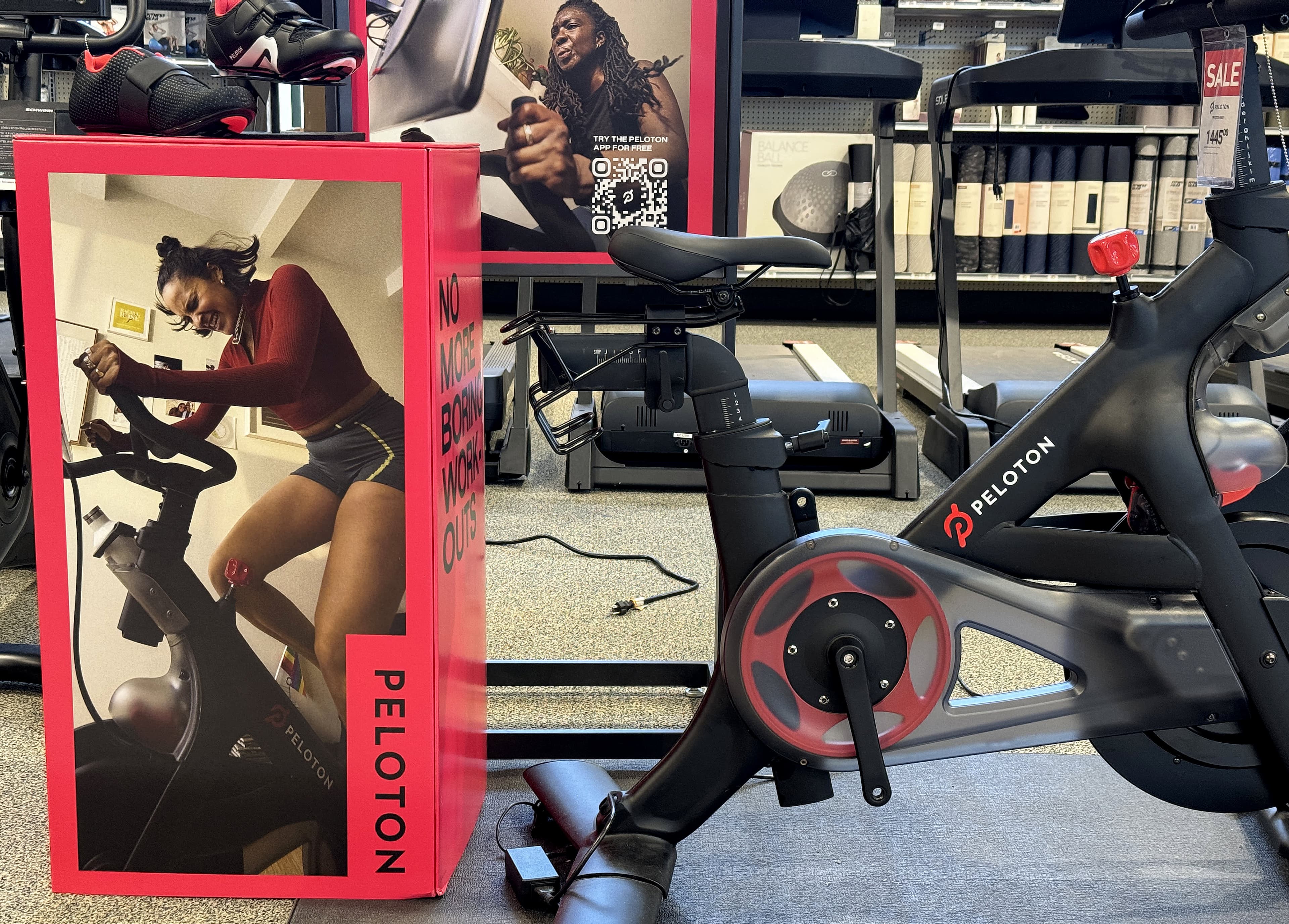 Peloton raises its full-year profit guidance, but expects the holiday quarter to be softer than expected
